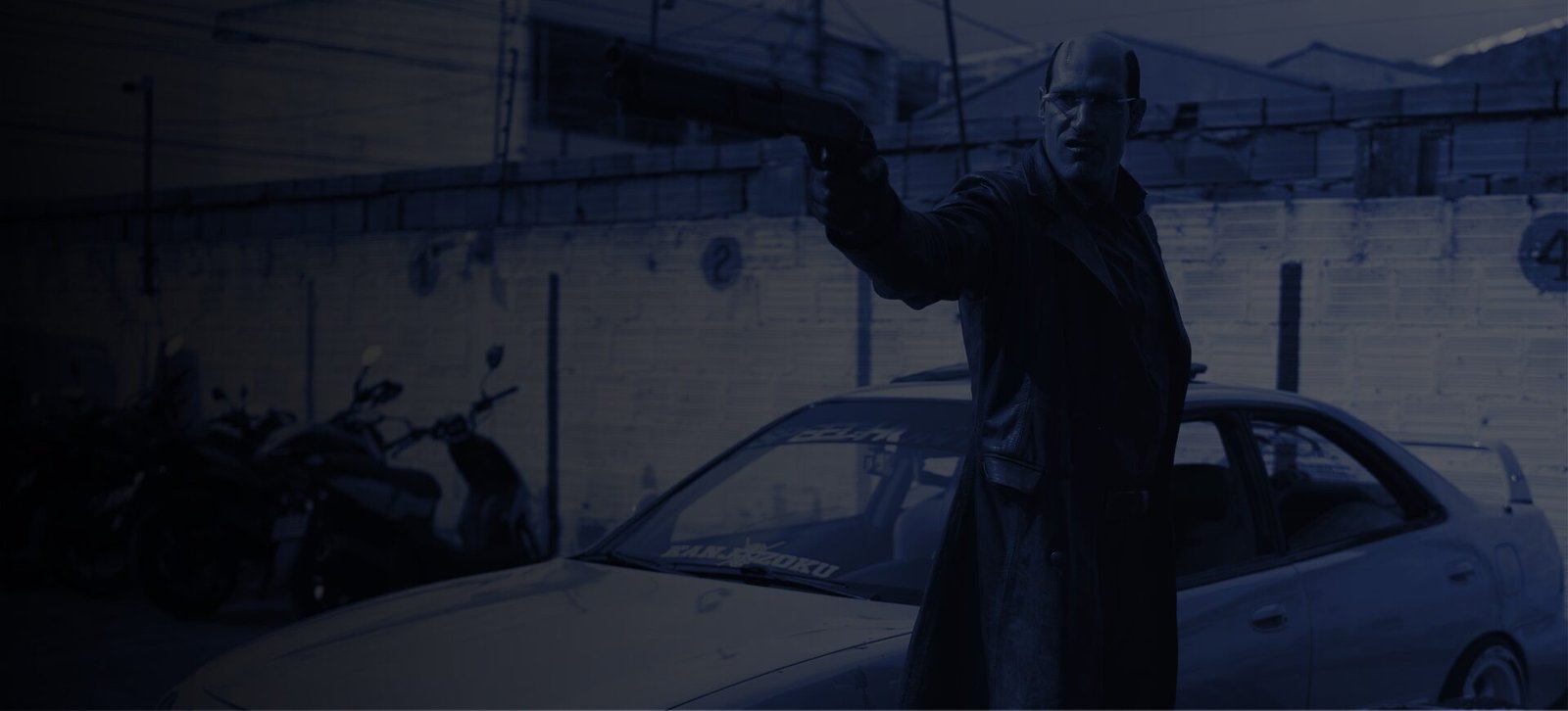 Actor performing beside a vehicle on a film set, representing LionTrust entertainment projects.